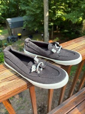 Sperry woman’s Black Canvas Boat Shoes with White Accents